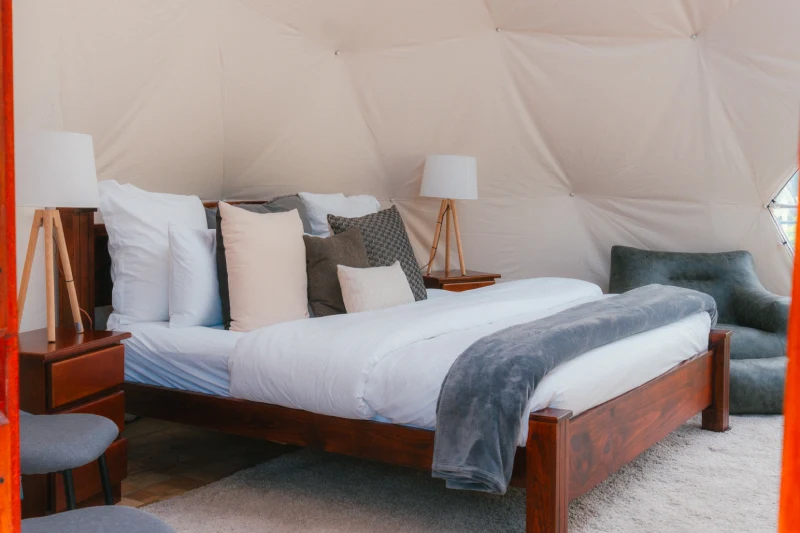 Family dome interior with panoramic window over the mountains