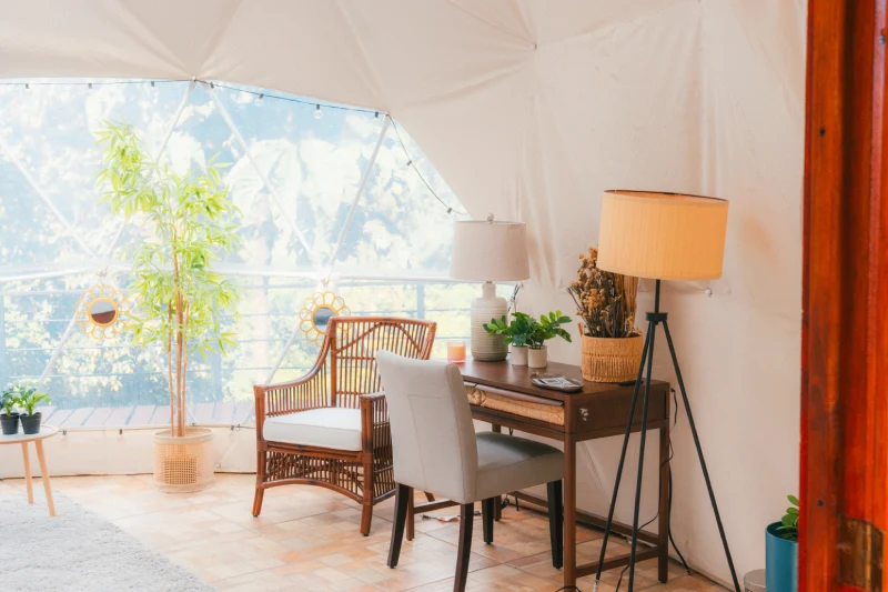Family dome decor with a golden sunburst mirror